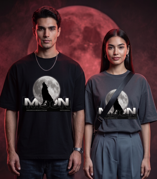 Two models wearing matching graphic t-shirts featuring a wolf howling at a full moon with the text 'MOON' and website text below. The male model wears a black t-shirt and the female model wears a dark gray t-shirt, set against a dark background with a large red moon.
